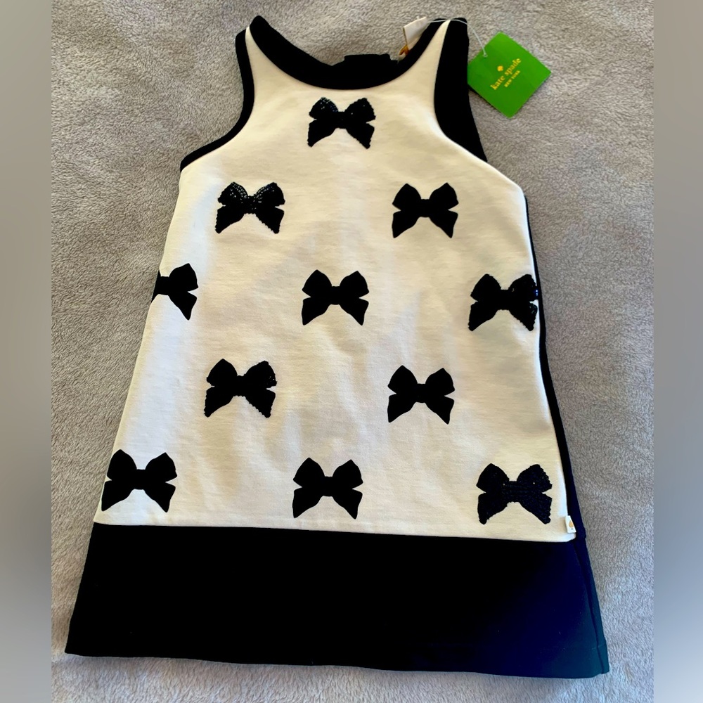 Kate Spade size 4 children’s dress. Never been worn. Tag still on.